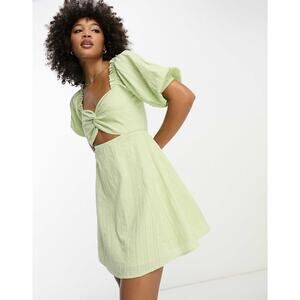 ASOS DESIGN knot front mini dress in textured spot in apple